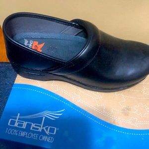 Dansko black leather clogs